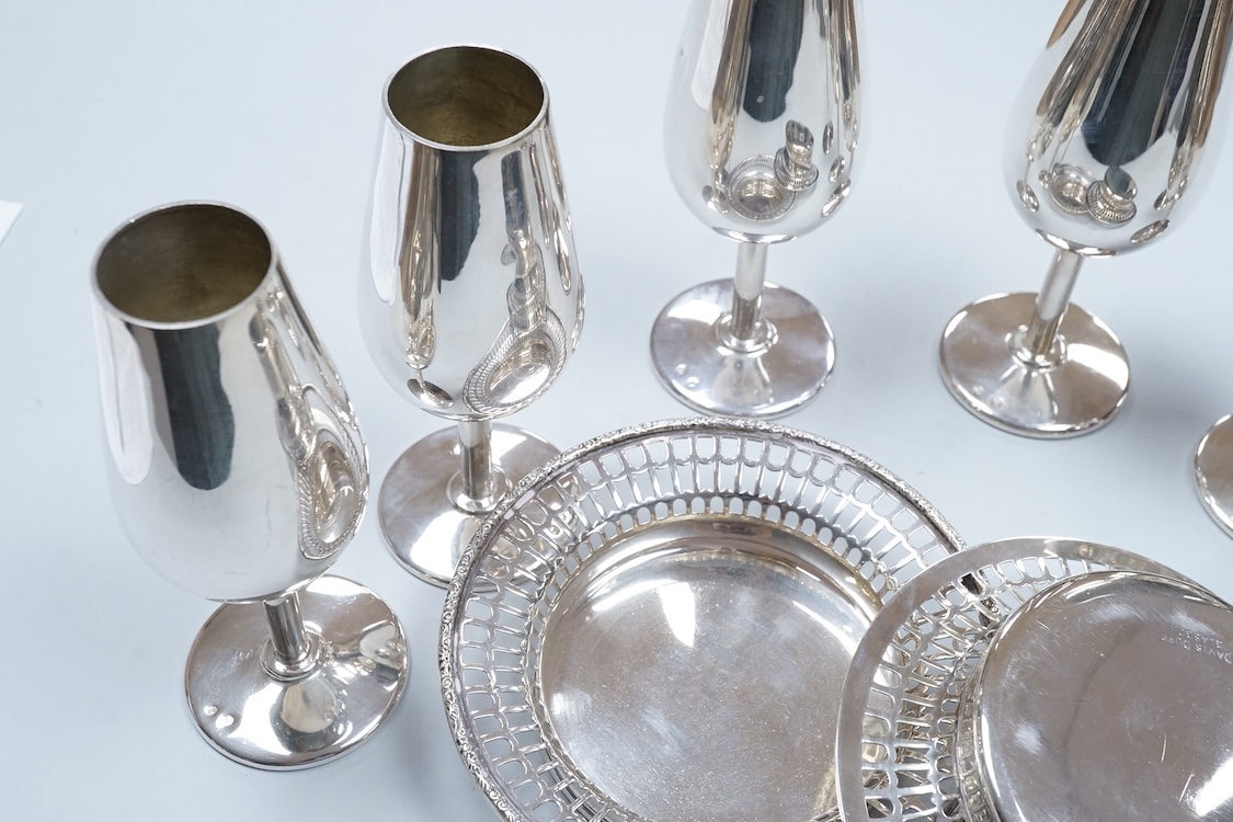 A pair of George VI silver bonbon dishes, by Davis, Duff & Son Birmingham, 1937, diameter 12.3cm, together with a set of six continental plated flutes.